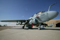 An EA-6B Prowler sits in front of a reinforced hangar after landing at Al Asad, Iraq, Jan. 20, 2005. Photo by Cpl. Paul Leicht